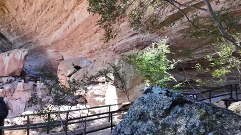 Visitors Walking Beneath Massive Sandstone Rock Shelter In Serra Da Capivara Stock Footage 346032514