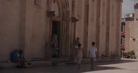 Visitors Walking Past St James Cathedral Entrance Video stock 336928234