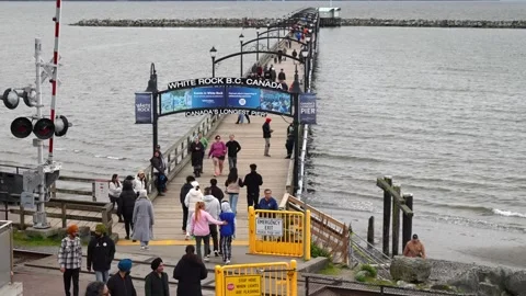 Visitors at White Rock Pier on Cloudy Day, BC, Canada, April 7, 2024 Stock-Footage 271383269