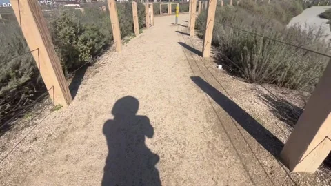 Vista-del-sol-park-walking-shadow-desert-pathway-california Stock Footage 331540468