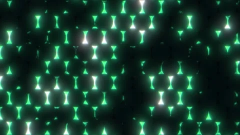 Visual display of glowing shapes transitioning in a mesmerizing pattern at night Video stock 300105028