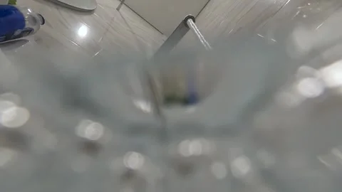 A visual exploration of water transitions: from a relaxing shower to the Stock Footage 328622374