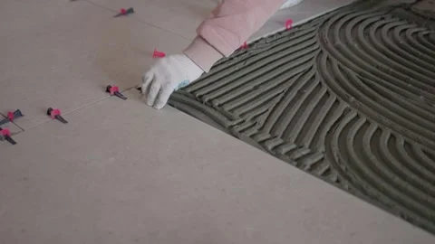 Visual presentation of tile fitting procedures and tools used. Comprehensive Stock Footage 347879055