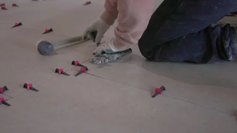 Visual presentation of tile fitting procedures and tools used. Comprehensive Stock Footage 347879099
