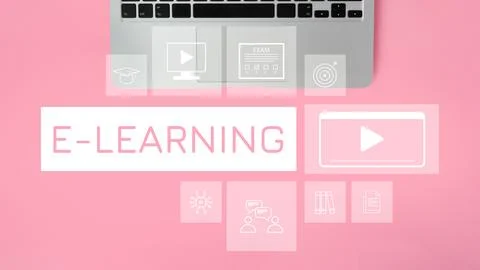 Visual representation of e learning elements on a pink surface with a laptop Stock Photos