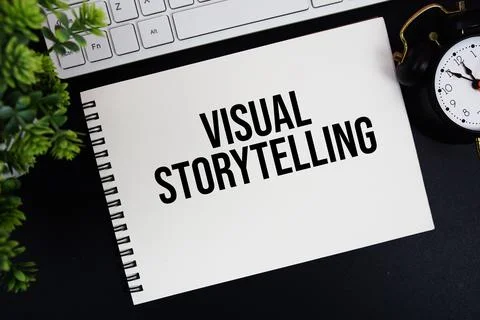 Visual Storytelling text written on notepad with keyboard and alarm clock o.. Stock Photos