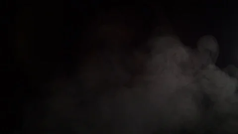 Visualization of smell in the form of a white cloud on a black background Stock Footage 105675857