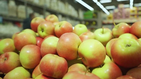 A visually appealing and attractive display of Fresh Red and Green Apples at the Stock Footage 287230672