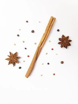 A visually striking composition featuring cinnamon sticks and star anise pods Stock-Fotos