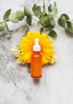Vitamic C anti aging serum in orange bottle Stock Photos