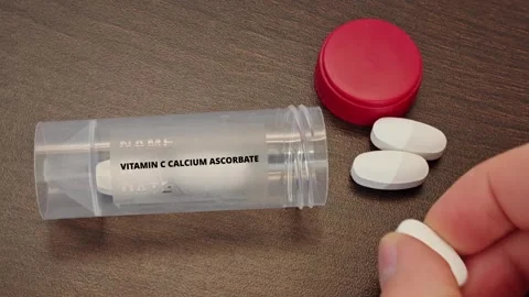 VITAMIN C CALCIUM ASCORBATE mineral compound supplement for mineral intake and Stock Footage 338416069
