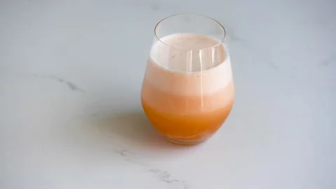 Vitamin C effervescent tablet dissolving in a glass of water Stock Footage 132508694