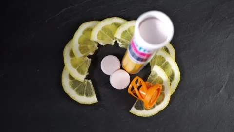 Vitamin C effervescent tablet - Tablets with lemon fruit Stock Footage 271637781