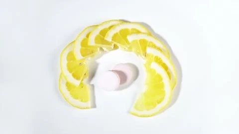 Vitamin C effervescent tablet - Tablets with lemon fruit - Brause Stock Footage 282382692
