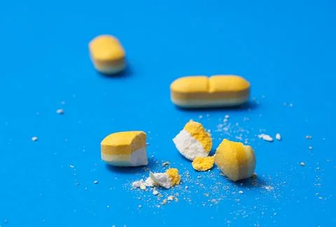 Vitamin C pills on blue background,Ascorbic Acid Tablets Stock Photos