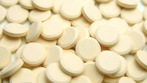 Vitamin C tablets rotating Stock Footage 266058005