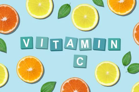 Vitamin C top view slice blue background Stock Photos