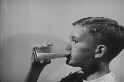 Vitamin D can be consumed in Milk with added Vitamin D or by absorbing sunlight Stock Footage 92635186