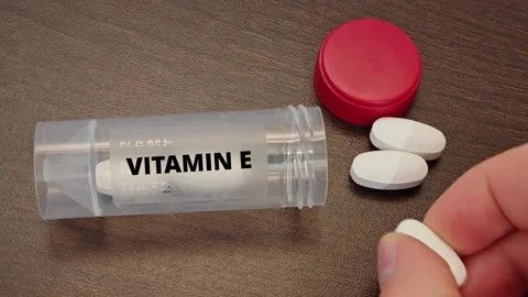 VITAMIN E antioxidant supplement for antioxidant and cellular protection patient Stock Footage 338416065