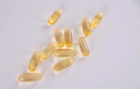 Vitamin E or Omega 3 capsules for healthy nutrition and beauty Photos