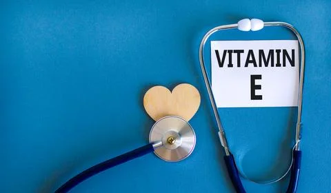 Vitamin E tocopherols symbol. Concept words Vitamin E on beautiful white card Stock-Fotos