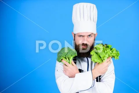 Vitamin. man use kitchenware. Professional chef in uniform. Healthy food and Stock Photos