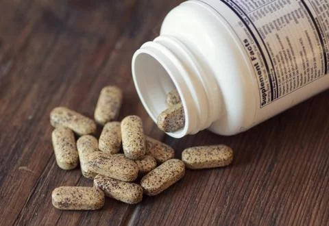 Vitamin pills close up Stock Photos