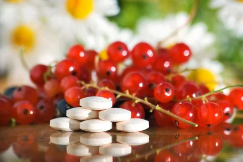 Vitamin tablets Stock Photos