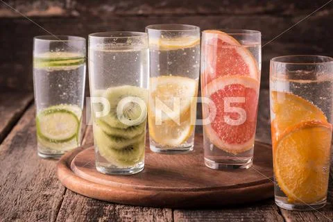 Vitamin Water With Fruits, Refreshment Cold Drink On Wooden Background