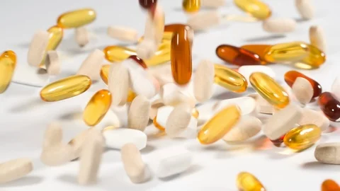Vitamins and supplements fall in slow motion Stock-Footage 119248556