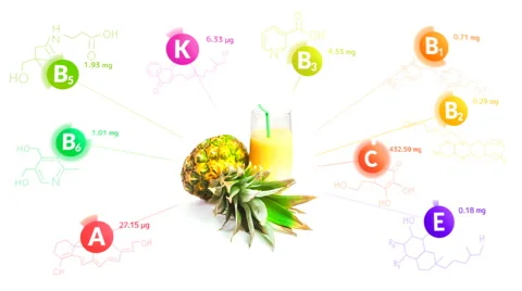 Vitamins fly out of the pineapple juice with the formulas and nutrition facts Stock Footage 63055700
