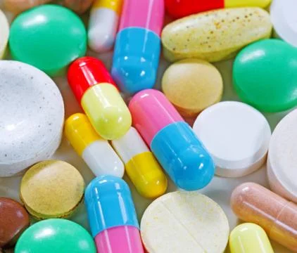 Vitamins, omega 3, cod-liver oil, dietary supplement and tablets an embankmen Stock Photos