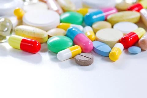 Vitamins, omega 3, cod-liver oil, dietary supplement and tablets an embankmen Stock Photos