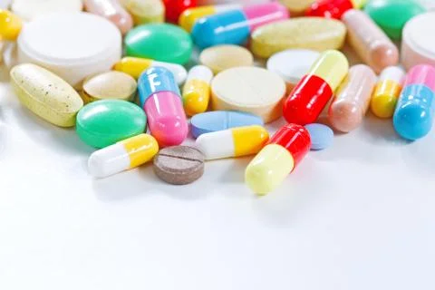 Vitamins, omega 3, cod-liver oil, dietary supplement and tablets an embankmen Stock Photos