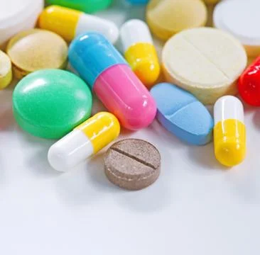 Vitamins, omega 3, cod-liver oil, dietary supplement and tablets an embankmen Stock Photos