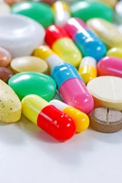 Vitamins, omega 3, cod-liver oil, dietary supplement and tablets an embankmen Stock Photos