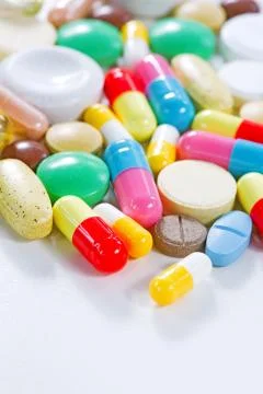 Vitamins, omega 3, cod-liver oil, dietary supplement and tablets an embankmen Stock Photos