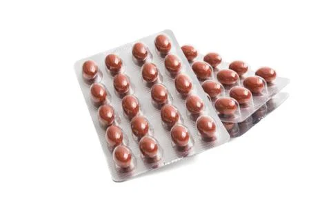 Vitamins in package isolated Stock Photos