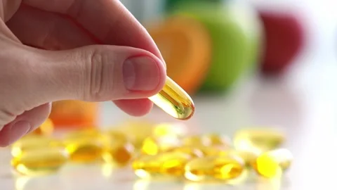 Vitamins in a pill box. Daily, regular intake of dietary supplements. The concep Stock Footage 276215560