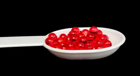 Vitamins in a spoon Stock Photos