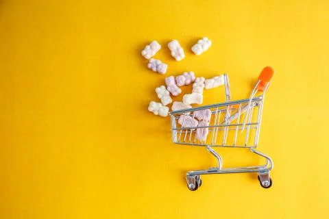 Vitamins on yellow background Stock Photos