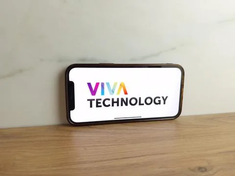 Viva Technology logo displayed on mobile phone Stock Photos