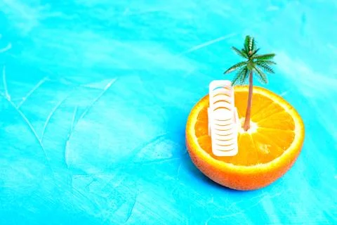 Vivid Beach Vacation Background with Orange Fruit Stockfoto's