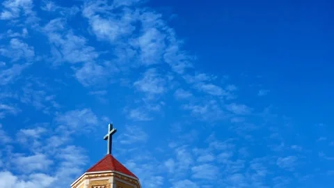 Vivid Blue Sky with Clouds and Church Steeple with Cross Stock Footage 230019940
