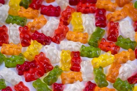 Vivid candy pattern. Rhythmic colorful gummy bear layout for artistic background Stockfoto's