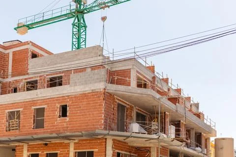 Vivid capture of construction site showcasing building in progress with Stock Photos