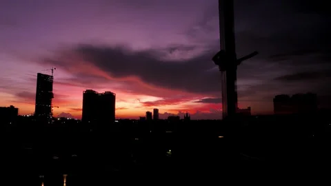 Vivid city sunset transition to dark night through open glass window Stock Footage 346162388