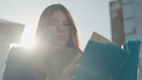 Vivid descriptive imagery. Scene depicts woman and poet outdoors. An artistic Stock Footage 337650692