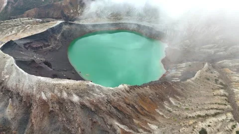 Vivid Emerald Crater Lake | Mt. Zao | Japan - 4K Aerial Video Stock Footage 329051075