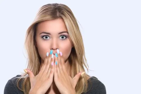 A vivid expression of emotion faces. Scared worried upset blonde. 写真素材